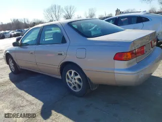 2001 Toyota Camry CE with VIN 4T1BG22K91U114096, listed as a IAAI auction lot 41070221 with 123,637 mi miles. Bid and sale history available at carsss.com. Image 3.