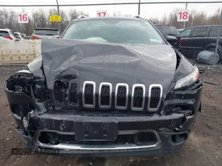 2014 Jeep Cherokee Limited with VIN 1C4PJMDB1EW156776, listed as a IAAI auction lot 41852167 with 130,514 mi miles and . Bid and sale history available at DreamBid. Image 13.
