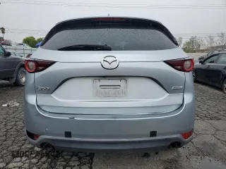 2017 Mazda CX-5 Touring with VIN JM3KFACL9H0183937, listed as a Copart auction lot 48861865 with 91,268 mi miles and Salvage Title. Bid and sale history available at carsss.com. Image 6.