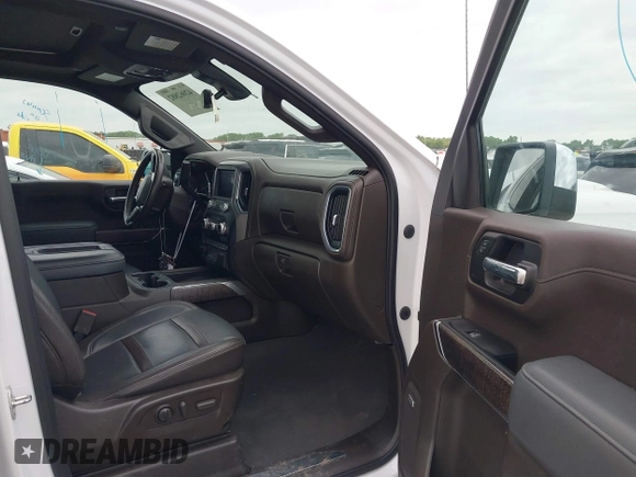 2022 GMC Sierra 1500 Denali with VIN 3GTU9FELXNG127029, listed as a IAAI auction lot 42062882 with 24,082 mi miles and . Bid and sale history available at DreamBid. Image 5.