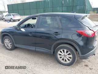 2014 Mazda CX-5 Sport with VIN JM3KE4BE4E0426931, listed as a IAAI auction lot 42055582 with 121,418 mi miles. Bid and sale history available at carsss.com. Image 14.