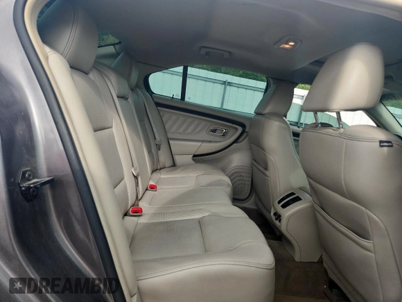 2011 Ford Taurus Limited z VIN 1FAHP2JW1BG156691, wystawiony jako Copart lot #59811755 z przebiegiem 162 828 mil mil oraz Szkoda całkowita • Salvage title. Historia ofert i sprzedaży dostępna na DreamBid. Obrazek 10.