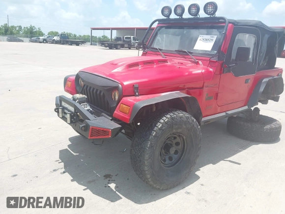 1999 Jeep Wrangler SE with VIN 1J4FY29P8XP464616, listed as a IAAI auction lot 42538529 with 126,497 mi miles and . Bid and sale history available at DreamBid. Image 2.