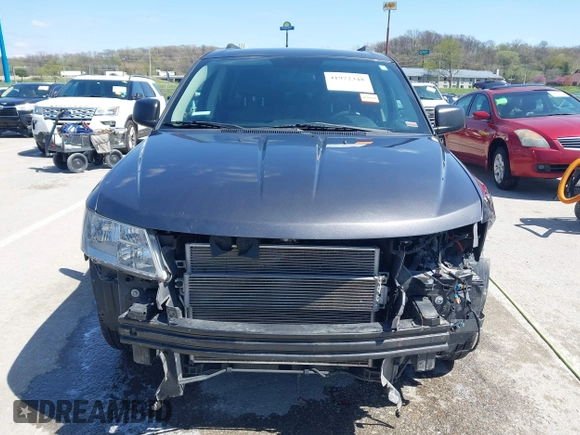 2014 Dodge Journey SE with VIN 3C4PDCAB7ET136799, listed as a IAAI auction lot 41972348 with 163,357 mi miles. Bid and sale history available at carsss.com. Image 13.