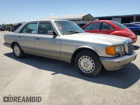 1990 Mercedes-Benz 300 with VIN WDBCA24D1LA529716, listed as a Copart auction lot 56581335 with 122,286 mi miles and Salvage Title. Bid and sale history available at DreamBid. Image 4.