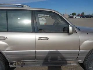 2000 Lexus LX 470 with VIN JT6HT00W0Y0098917, listed as a IAAI auction lot 41937661 with 180,980 mi miles and . Bid and sale history available at DreamBid. Image 13.