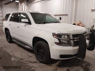 2018 Chevrolet Tahoe Commercial with VIN 1GNSKDEC1JR240868, listed as a IAAI auction lot 41608806 with 138,126 mi miles. Bid and sale history available at carsss.com. Image 1.