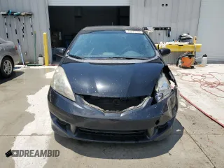 2011 Honda Fit Sport z VIN JHMGE8H51BC015640, wystawiony jako Copart lot #57870555 z przebiegiem 179 497 mil mil oraz Szkoda całkowita • Salvage title. Historia ofert i sprzedaży dostępna na DreamBid. Obrazek 5.