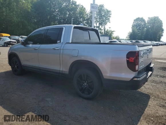 2018 Honda Ridgeline RTL-E with VIN 5FPYK3F77JB014975, listed as a Copart auction lot 59798125 with 124,361 mi miles and Clean title. Bid and sale history available at DreamBid. Image 2.