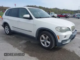 2010 BMW X5 35d with VIN 5UXFF0C52ALT75063, listed as a IAAI auction lot 41924828 with 104,513 mi miles. Bid and sale history available at carsss.com. Image 1.
