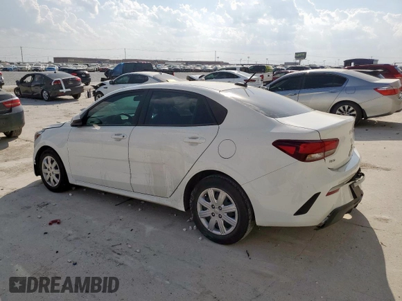 2023 Kia Rio S with VIN 3KPA24AD7PE549736, listed as a Copart auction lot 50428615 with 34,431 mi miles and Salvage Title. Bid and sale history available at carsss.com. Image 2.