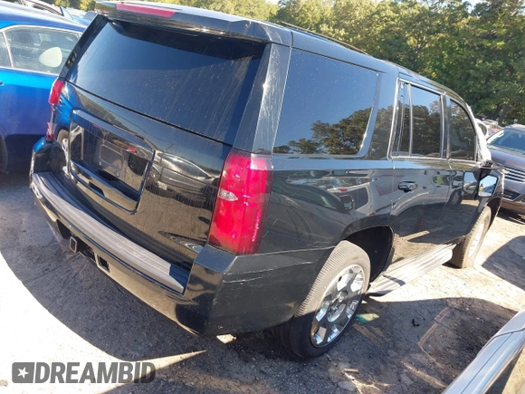 2015 Chevrolet Tahoe Commercial with VIN 1GNLC2EC3FR280365, listed as a IAAI auction lot 40580594 with 195,740 mi miles and . Bid and sale history available at DreamBid. Image 4.