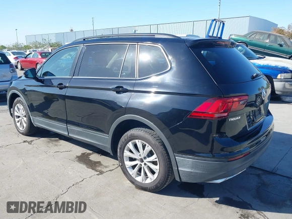 2018 Volkswagen Tiguan S with VIN 3VV1B7AX1JM091928, listed as a IAAI auction lot 42283454 with 53,650 mi miles and . Bid and sale history available at DreamBid. Image 3.