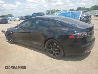 2014 Tesla Model S 60 with VIN 5YJSA1S16EFP50982, listed as a Copart auction lot 54426015 with 76,515 mi miles and Salvage title. Bid and sale history available at DreamBid. Image 2.