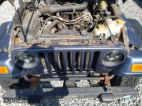 2002 Jeep Wrangler Sport with VIN 1J4FA49S92P715480, listed as a Copart auction lot 55157545 with 153,560 mi miles and Clean Title. Bid and sale history available at carsss.com. Image 12.