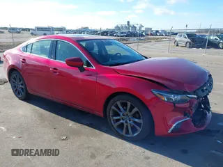 2016 Mazda Mazda6 i Grand Touring with VIN JM1GJ1W51G1443203, listed as a IAAI auction lot 41247354 with 144,840 mi miles. Bid and sale history available at carsss.com. Image 1.