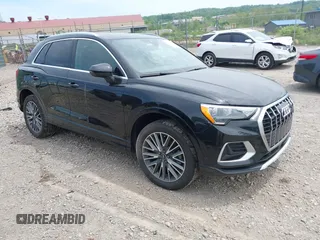 2021 Audi Q3 Premium z VIN WA1AUCF35M1071216, wystawiony jako IAAI lot #42229889 z przebiegiem 63 854 mil mil oraz . Historia ofert i sprzedaży dostępna na DreamBid. Obrazek 1.
