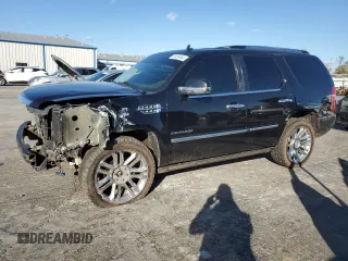 2011 Cadillac Escalade Platinum Edition z VIN 1GYS4DEF5BR398235, wystawiony jako Copart lot #80499464 z przebiegiem 242 380 mil mil oraz Szkoda całkowita • Salvage title. Historia ofert i sprzedaży dostępna na DreamBid. Obrazek 1.