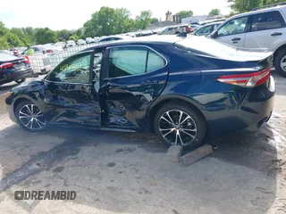 2018 Toyota Camry LE with VIN 4T1B11HK2JU579550, listed as a IAAI auction lot 42309663 with 40,868 mi miles and . Bid and sale history available at DreamBid. Image 14.