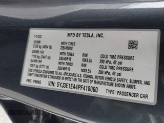 2023 Tesla Model 3 with VIN 5YJ3E1EA4PF410060, listed as a IAAI auction lot 42067624 with 59,934 mi miles and . Bid and sale history available at DreamBid. Image 9.