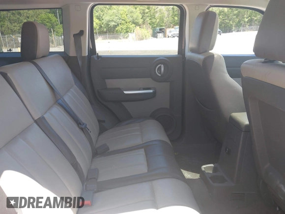 2007 Dodge Nitro SLT with VIN 1D8GU58K37W682094, listed as a IAAI auction lot 42155006 with 115,748 mi miles. Bid and sale history available at carsss.com. Image 8.