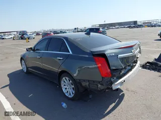2016 Cadillac CTS Sedan RWD with VIN 1G6AP5SX8G0106667, listed as a IAAI auction lot 39978567 with 96,773 mi miles. Bid and sale history available at carsss.com. Image 3.