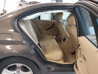 2015 BMW 3 Series 328i with VIN WBA3A5C57FF609734, listed as a IAAI auction lot 41392336 with 121,378 mi miles. Bid and sale history available at carsss.com. Image 8.
