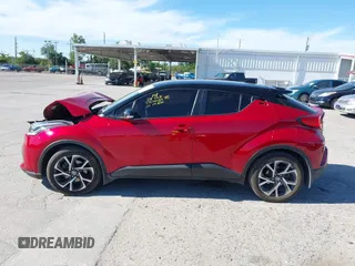 2020 Toyota C-HR LE with VIN JTNKHMBX3L1066720, listed as a IAAI auction lot 42042139 with 98,925 mi miles and . Bid and sale history available at DreamBid. Image 14.