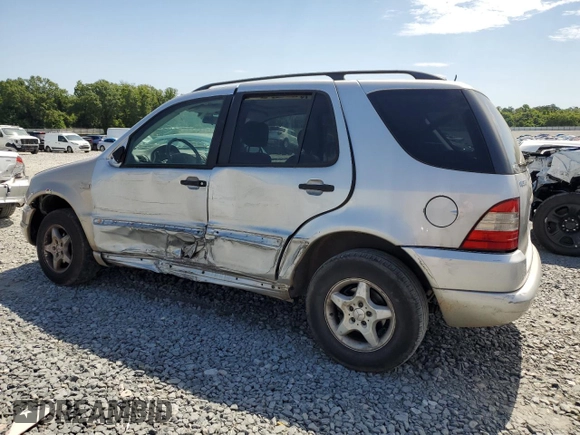 2001 Mercedes-Benz M-Class with VIN 4JGAB54EX1A271687, listed as a Copart auction lot 57046944 with 209,561 mi miles and Salvage Title. Bid and sale history available at carsss.com. Image 2.