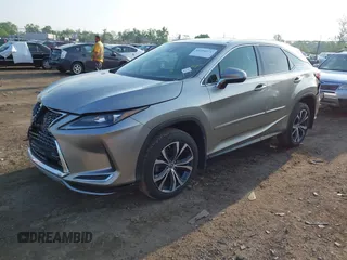 2022 Lexus RX 350 with VIN 2T2HZMAA6NC238967, listed as a IAAI auction lot 42294971 with 62,737 mi miles and . Bid and sale history available at DreamBid. Image 2.