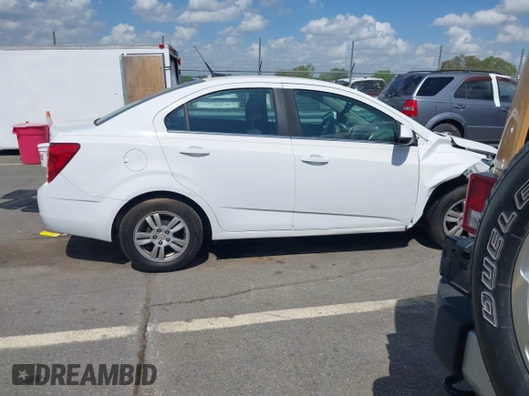 2014 Chevrolet Sonic LT with VIN 1G1JC5SH0E4232070, listed as a IAAI auction lot 41970353 with 140,557 mi miles and . Bid and sale history available at DreamBid. Image 13.