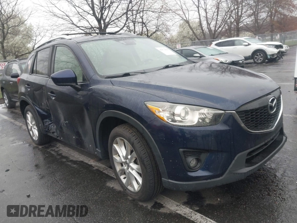 2014 Mazda CX-5 Grand Touring with VIN JM3KE4DY8E0366644, listed as a IAAI auction lot 41971438 with 135,644 mi miles and . Bid and sale history available at carsss.com. Image 1.