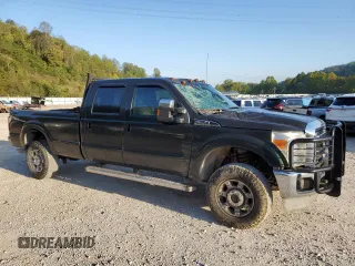 2012 Ford F-350 XL with VIN 1FT8W3B67CEC66479, listed as a Copart auction lot 74112284 with 64,711 mi miles and Salvage title. Bid and sale history available at DreamBid. Image 4.