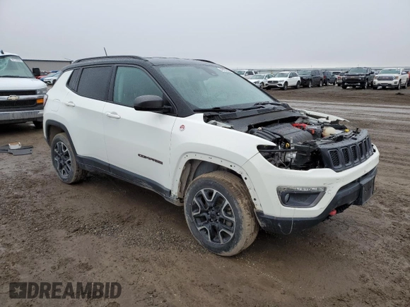 2021 Jeep Compass Trailhawk with VIN 3C4NJDDB5MT590369, listed as a Copart auction lot 46107685 with 67,857 mi miles and Salvage title. Bid and sale history available at DreamBid. Image 4.