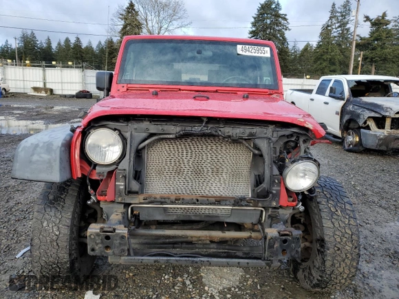 2009 Jeep Wrangler X with VIN 1J4FA24149L760959, listed as a Copart auction lot 49425955 with 128,813 mi miles and Salvage Title. Bid and sale history available at DreamBid. Image 5.