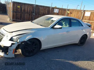 2014 Cadillac CTS Luxury AWD z VIN 1G6AX5SX3E0149360, wystawiony jako IAAI lot #41020479 z przebiegiem 98 917 mil mil oraz . Historia ofert i sprzedaży dostępna na DreamBid. Obrazek 13.