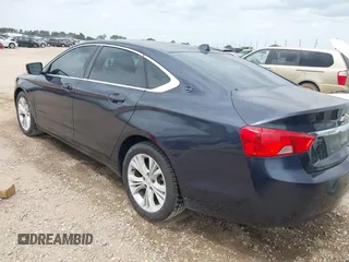 2014 Chevrolet Impala LT with VIN 2G1115SLXE9222573, listed as a IAAI auction lot 42119082 with 147,011 mi miles and . Bid and sale history available at DreamBid. Image 3.