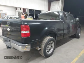 2006 Ford F-150 STX with VIN 1FTRX12W96NB42417, listed as a IAAI auction lot 41910493 with 220,559 mi miles. Bid and sale history available at carsss.com. Image 4.