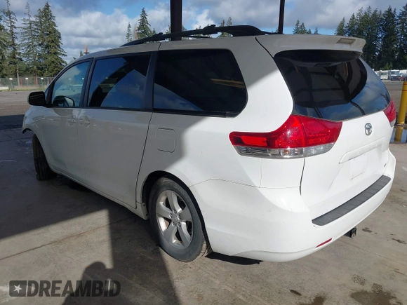 2014 Toyota Sienna LE AAS with VIN 5TDKK3DC4ES505293, listed as a IAAI auction lot 42021409 with 70,319 mi miles. Bid and sale history available at carsss.com. Image 3.