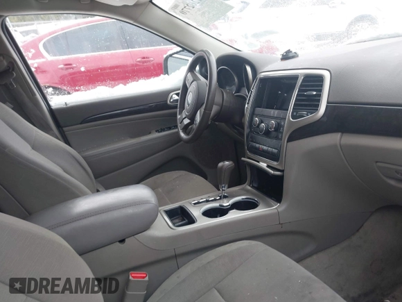 2013 Jeep Grand Cherokee Laredo with VIN 1C4RJFAGXDC542987, listed as a IAAI auction lot 41262770 with 199,273 mi miles. Bid and sale history available at carsss.com. Image 5.