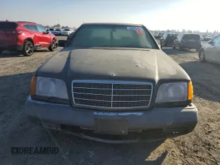 1994 Mercedes-Benz S with VIN WDBGA51EXRA151565, listed as a Copart auction lot 83085464 with 217,188 mi miles and Clean Title. Bid and sale history available at DreamBid. Image 5.