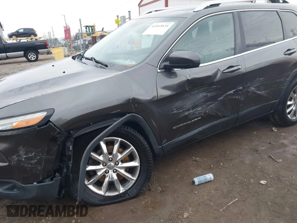 2014 Jeep Cherokee Limited with VIN 1C4PJMDS3EW137985, listed as a IAAI auction lot 41543651 with 131,312 mi miles. Bid and sale history available at carsss.com. Image 6.