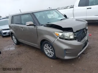 2011 Scion xB with VIN JTLZE4FE9B1141752, listed as a IAAI auction lot 41797088 with 114,357 mi miles. Bid and sale history available at carsss.com. Image 1.