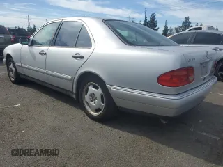 1998 Mercedes-Benz E with VIN WDBJF70F6WA643471, listed as a Copart auction lot 77189934 with 251,579 mi miles and Clean Title. Bid and sale history available at DreamBid. Image 2.