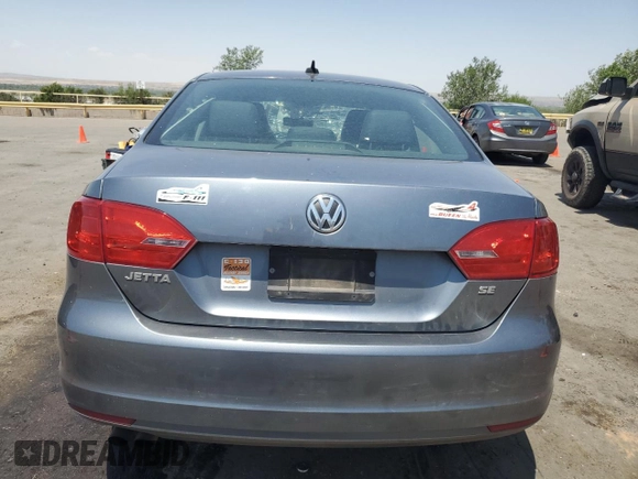 2014 Volkswagen Jetta SE with VIN 3VWD17AJ2EM360824, listed as a Copart auction lot 61420075 with 142,101 mi miles and Salvage title. Bid and sale history available at DreamBid. Image 6.