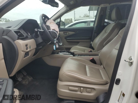 2017 Honda Pilot Touring with VIN 5FNYF6H99HB025600, listed as a Copart auction lot 88131475 with 131,939 mi miles and Salvage Title. Bid and sale history available at DreamBid. Image 7.