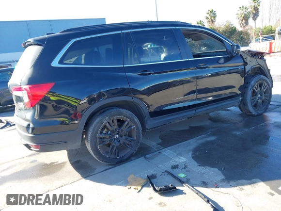 2022 Honda Pilot Special Edition with VIN 5FNYF6H26NB102339, listed as a IAAI auction lot 41194432 with 54,121 mi miles. Bid and sale history available at carsss.com. Image 4.
