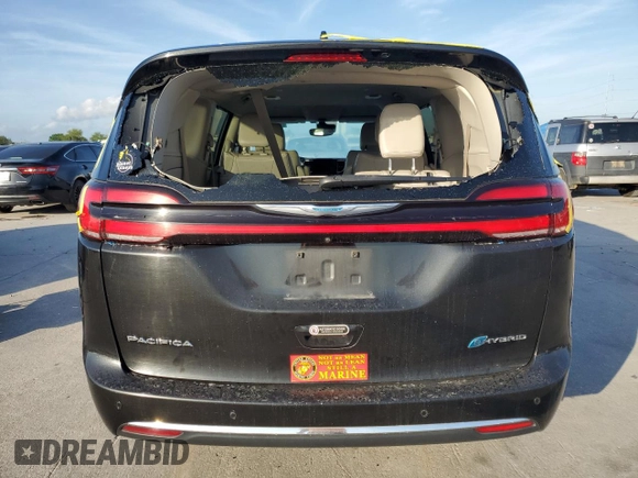 2021 Chrysler Pacifica Hybrid Touring L with VIN 2C4RC1L76MR578340, listed as a Copart auction lot 54748445 with 137,390 mi miles and Salvage title. Bid and sale history available at DreamBid. Image 6.