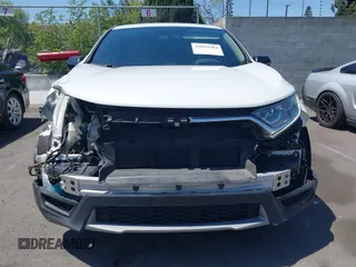 2019 Honda CR-V LX with VIN 2HKRW5H33KH407463, listed as a IAAI auction lot 42034584 with 85,454 mi miles and . Bid and sale history available at DreamBid. Image 13.