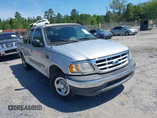 2003 Ford F-150 XL with VIN 1FTRX17W43NA77481, listed as a IAAI auction lot 42155310 with 230,322 mi miles. Bid and sale history available at carsss.com. Image 1.